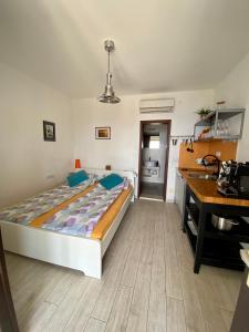 Postel nebo postele na pokoji v ubytování Villa Marijam
