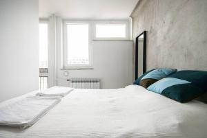 Posteľ alebo postele v izbe v ubytovaní Unique Studio with stunning view & Netflix