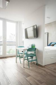 Posteľ alebo postele v izbe v ubytovaní Unique Studio with stunning view & Netflix