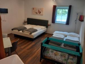 מיטה או מיטות בחדר ב-Apartment Riedhof