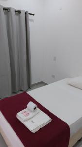 A bed or beds in a room at Casa de Mia