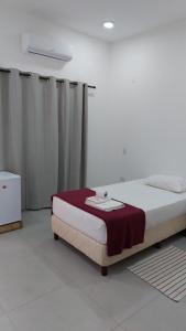 A bed or beds in a room at Casa de Mia