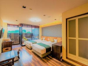 Postel nebo postele na pokoji v ubytování LiVEMAX RESORT Kinugawa