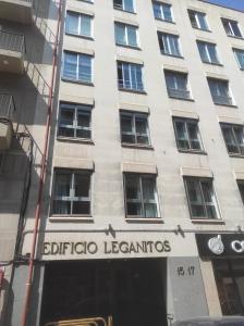 a building with the sign for the bibliota leendas at Apar. renovado en Leganitos (Gran Vía) con portero in Madrid