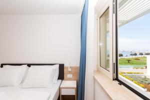 Postel nebo postele na pokoji v ubytování Superior Family Apartment Loti + 38 fotografií