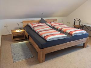 Postel nebo postele na pokoji v ubytování Ferienwohnung Lang