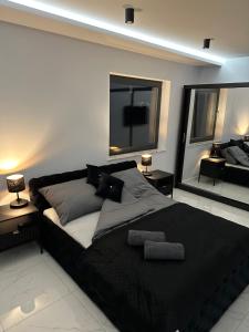 Postel nebo postele na pokoji v ubytování GLAMROOM Mechelinki