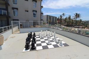 a chess board on the roof of a balcony at Seagull 404 in Margate