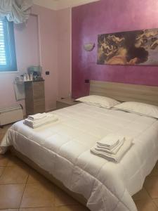 A bed or beds in a room at Casa Di Marzio