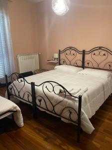 A bed or beds in a room at Casa Di Marzio