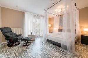 Ένα ή περισσότερα κρεβάτια σε δωμάτιο στο Aparthotel Alma Bonn