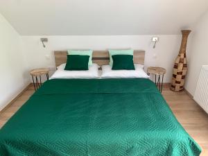 Postel nebo postele na pokoji v ubytování Nono Apartman Bükfürdő