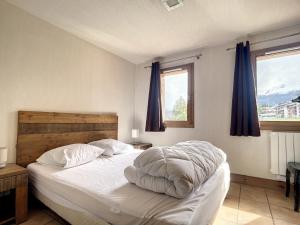 Posteľ alebo postele v izbe v ubytovaní La Plagne-les Coches vue Mont Blanc 6 pers piscine sauna + 13 fotografií