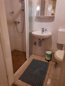 Kúpeľňa v ubytovaní CsillagVár apartman