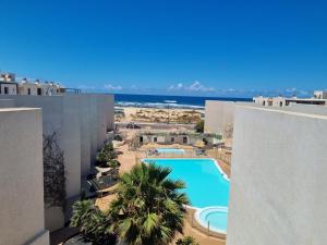 Basen w obiekcie Ola Cotillo! Ver y Sentir el Mar desde casa lub w pobliżu