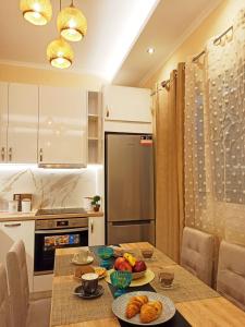 Kuchyň nebo kuchyňský kout v ubytování Elmar Apartment