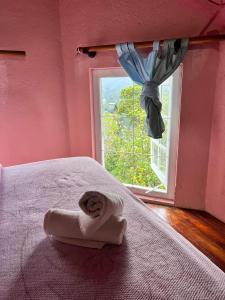 Postel nebo postele na pokoji v ubytování Sincere Wilderness Home stay