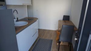 Kuchyň nebo kuchyňský kout v ubytování Apartments Jozef