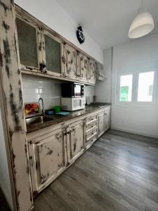 Kuchyňa alebo kuchynka v ubytovaní Casa Rosaura