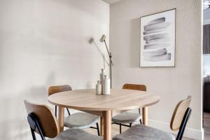 a dining room with a wooden table and chairs at Sunnyvale 1BR w WD Gym Pool nr FB Google SFO-730 in Sunnyvale