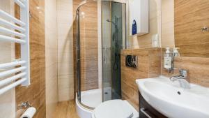 Kúpeľňa v ubytovaní Apartamenty Sun & Snow Kościelisko Residence