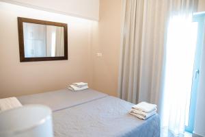 Posteľ alebo postele v izbe v ubytovaní Aspa Holidays
