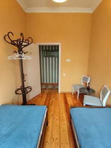 Letto o letti in una camera di Friendly Guest House