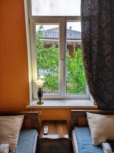 Area soggiorno di Friendly Guest House