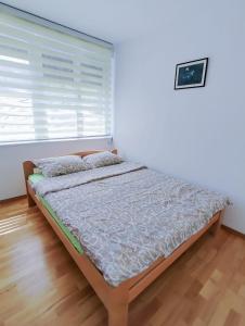 Postel nebo postele na pokoji v ubytování Apartman Mali Raj Rudnik II + 21 fotografií
