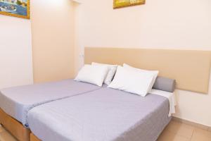 Posteľ alebo postele v izbe v ubytovaní Aspa Holidays