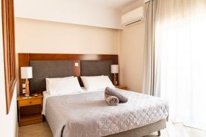 Posteľ alebo postele v izbe v ubytovaní Aspa Holidays