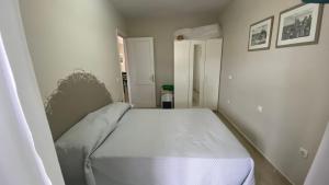 Łóżko lub łóżka w pokoju w obiekcie CASA OASI