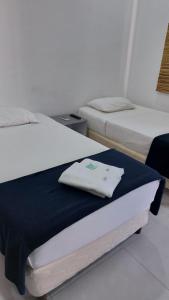 A bed or beds in a room at Casa de Mia