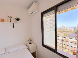Posteľ alebo postele v izbe v ubytovaní Capri Sunset Casasol