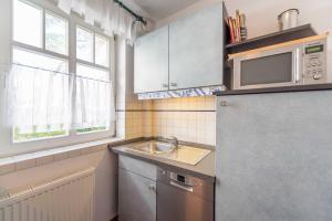 مطبخ أو مطبخ صغير في Appartement Ostseemuschel Binz
