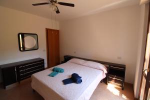 A bed or beds in a room at Appartamento Gori
