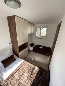 Postel nebo postele na pokoji v ubytování Mobile home Fran