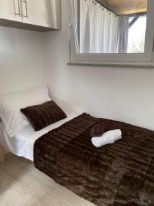 Postel nebo postele na pokoji v ubytování Mobile home Fran