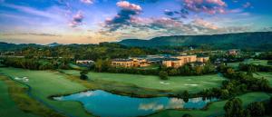 an aerial view of a resort with a golf course at MeadowView Marriott Conference Resort and Convention Center in Kingsport