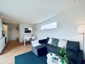 A seating area at BUSINESS APARTMENT in Deitingen Tiny House ZIMMERzuVERMIETEN