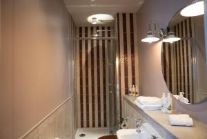 a bathroom with a sink and a mirror at Milsom Hotel Bath in Bath