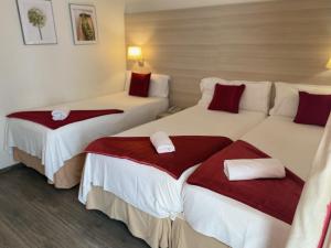 Postel nebo postele na pokoji v ubytování Hotel Norai