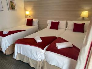 Postel nebo postele na pokoji v ubytování Hotel Norai