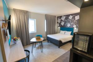 Postel nebo postele na pokoji v ubytování ibis Styles Antofagasta + 33 fotografií