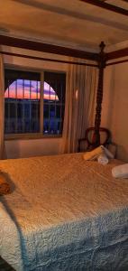 Posteľ alebo postele v izbe v ubytovaní Villa Don Giovanni Fuengirola, Piscina Privada y vistas al mar y a la Montaña