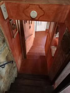 an overhead view of a staircase in a house at Morelli House in Montalbo