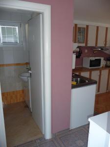 Kuchyň nebo kuchyňský kout v ubytování Apartments KIRSCHEY