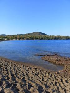 a beach with a body of water at Il Caimano bed & breakfast in Vulcano