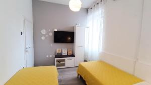 TV a/nebo společenská místnost v ubytování Rooms Diana