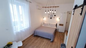 Posteľ alebo postele v izbe v ubytovaní Rooms Diana
